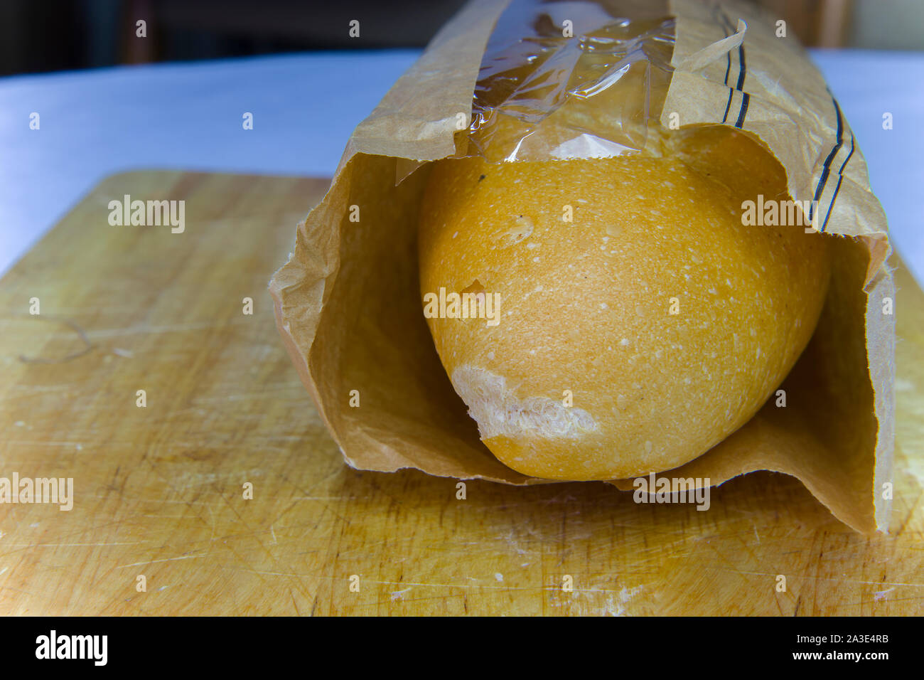 Fresh Baguette in a paper bag closeup copy space.High resolution image ...