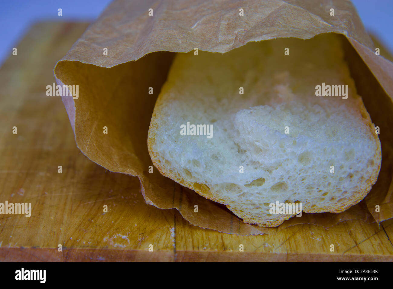 Fresh Baguette in a paper bag closeup copy space.High resolution image ...