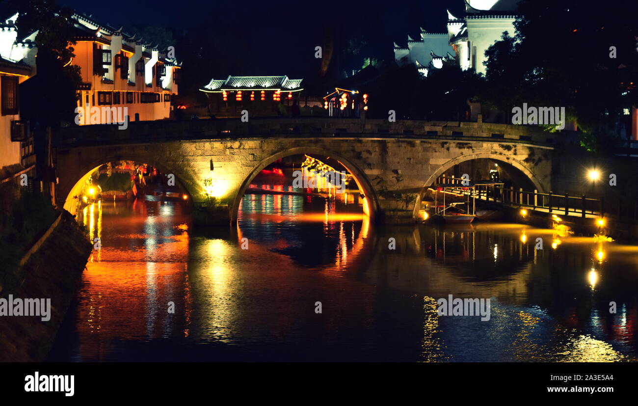 Chinese old town canal bridge and night lights, Sanhe, Anhui, China Stock Photo