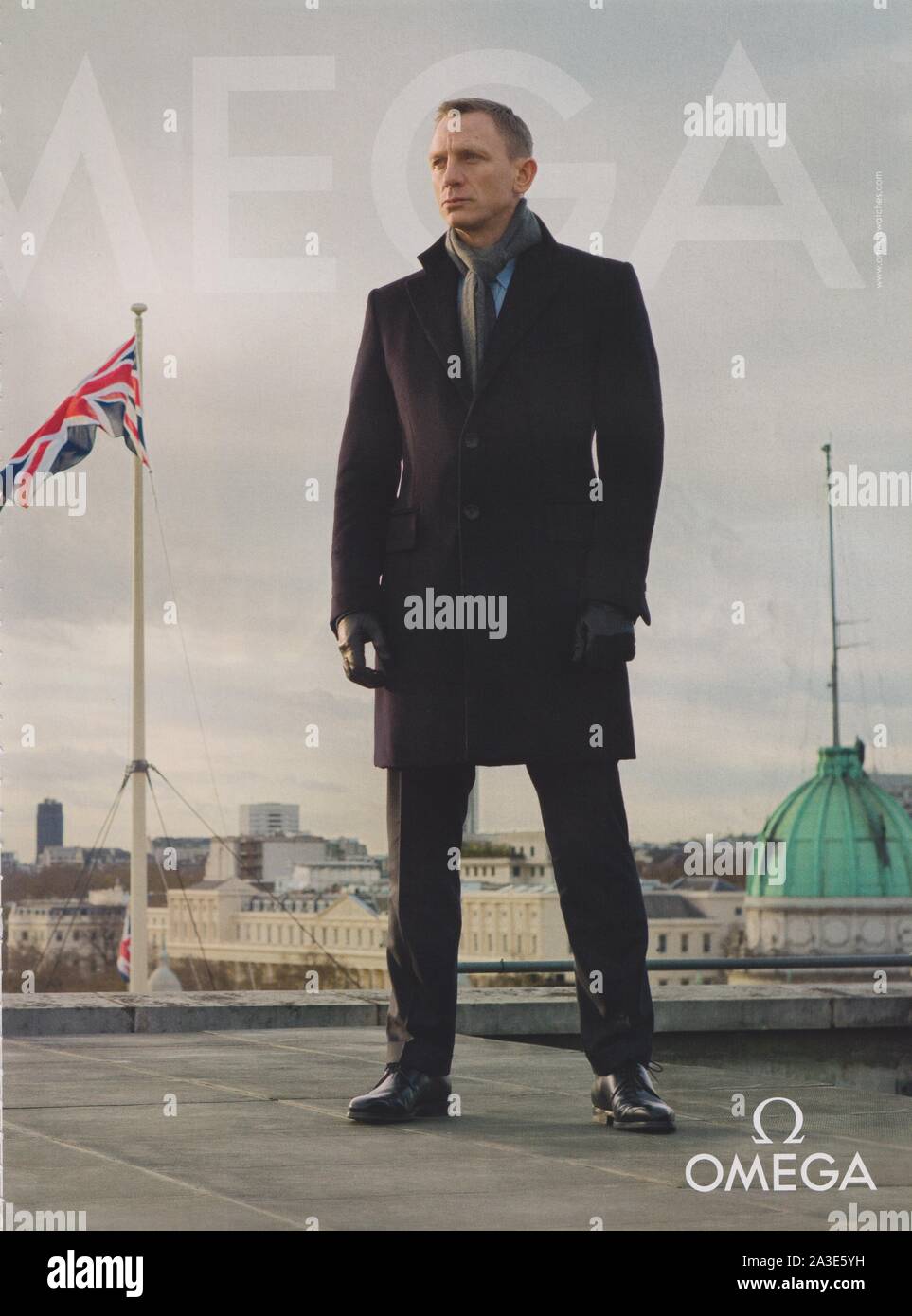 poster advertising OMEGA watch with Daniel Craig in magazine from 2012,  Skyfall James Bond's Choice, advertisement, creative OMEGA advert from  2010s Stock Photo - Alamy