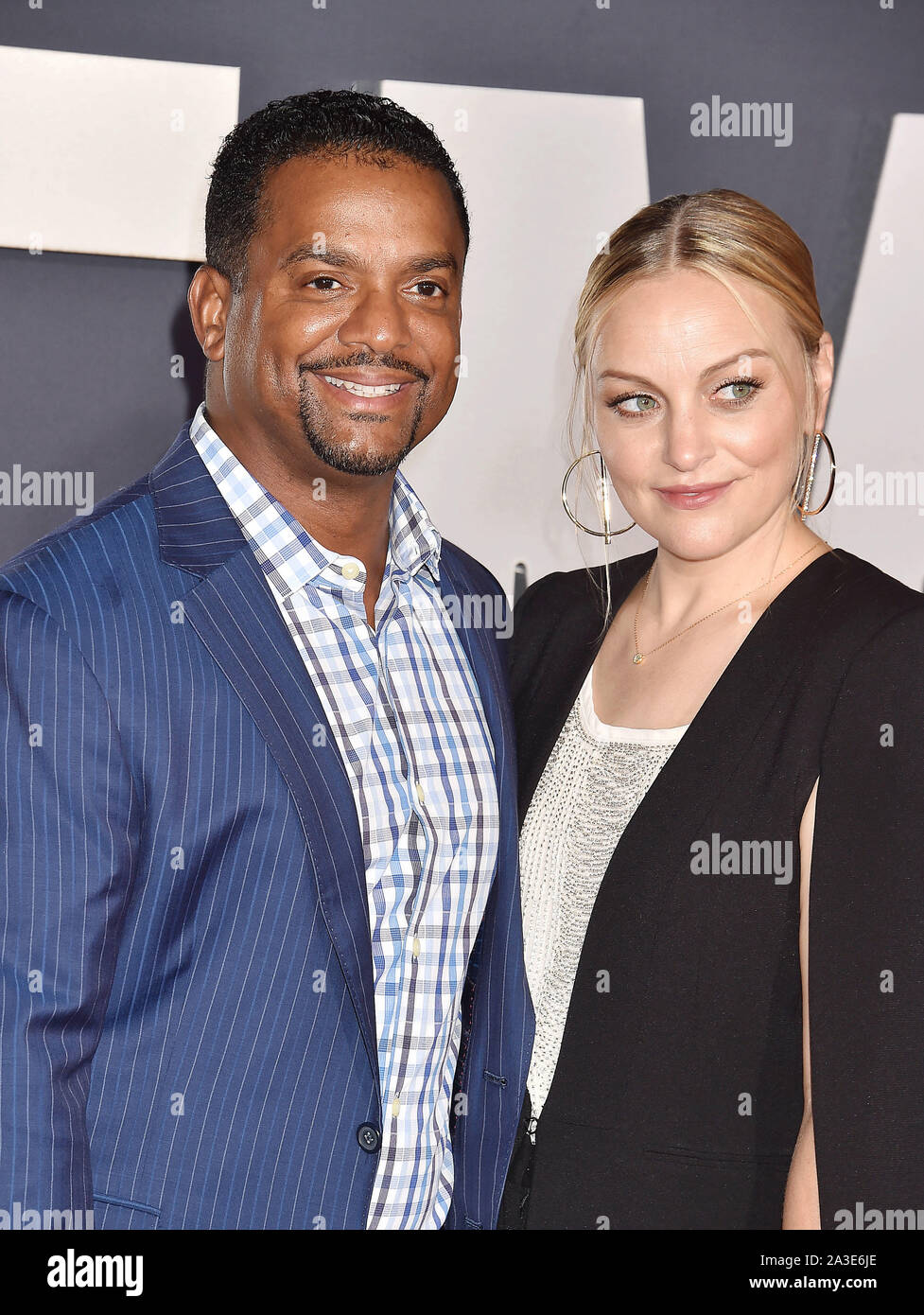 HOLLYWOOD, CA - OCTOBER 06: Alfonso Ribeiro and Angela Unkrich attend