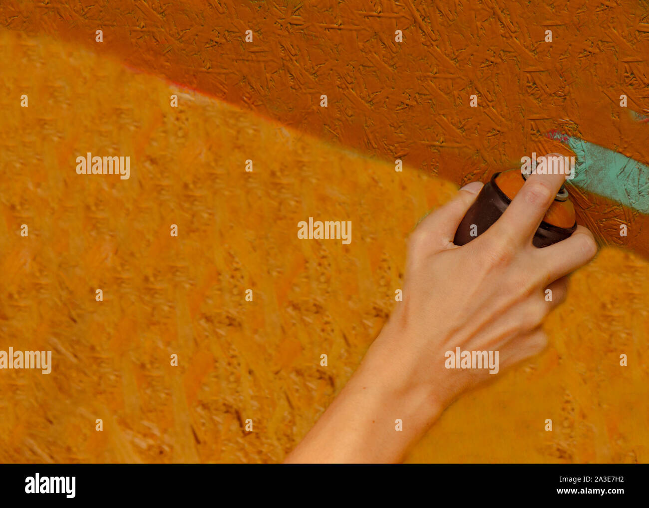 Male teen painting wall spray paint hi-res stock photography and images ...