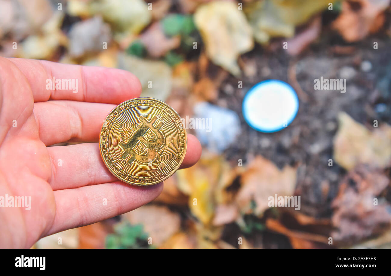 Hand Holding Golden And Silver Bitcoin In Autumn In Forest Park Modern Exchange Value Electronic Money Virtual Pay Used For Investing In Stocks Stock Photo Alamy