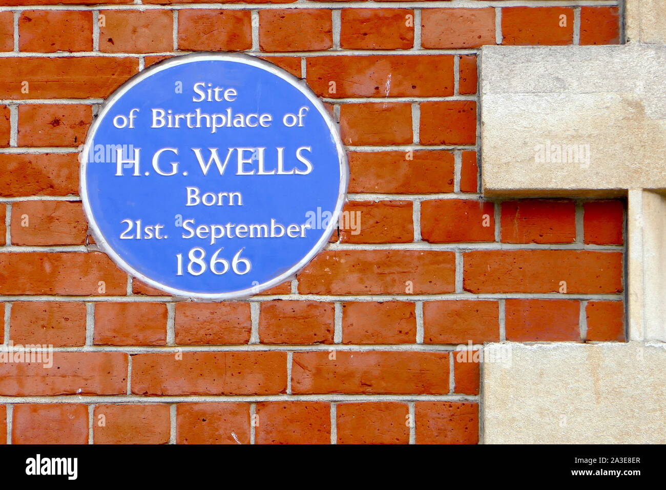 A Blue Plaque the Primark store in Bromley celebrates the birth of Science Fiction author H. G. Wells. Stock Photo