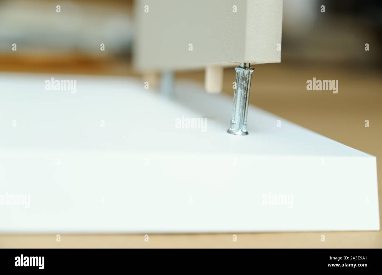 Mounting The Chest Of Drawers Joining Furniture Parts Stock Photo