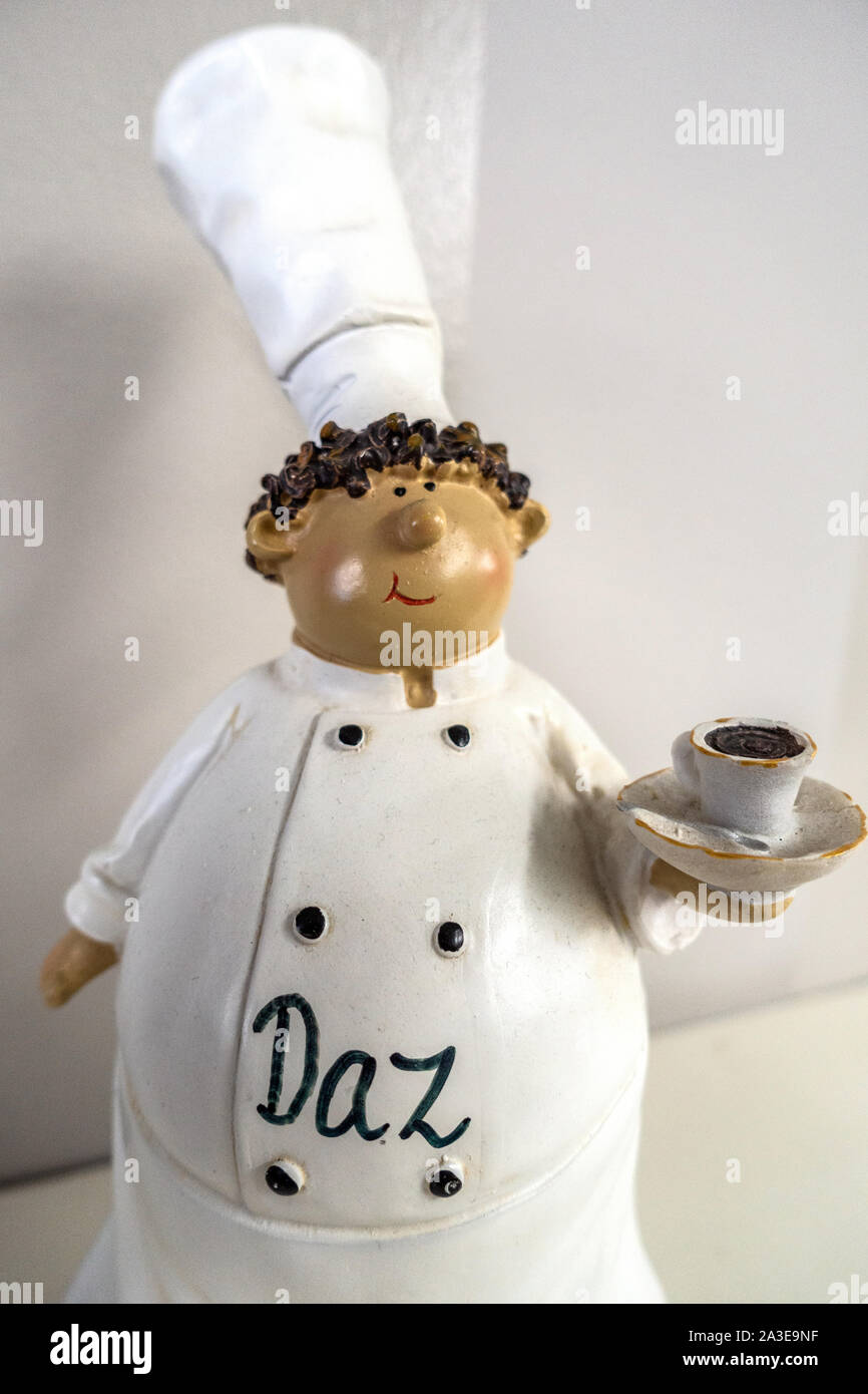Pottery figure of a chef in whites Stock Photo