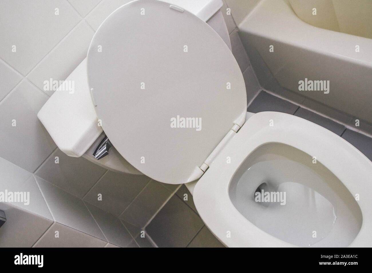 White wc toilet seat hotel clean wellbeing and leisure , clean background style copy paste . Stock Photo
