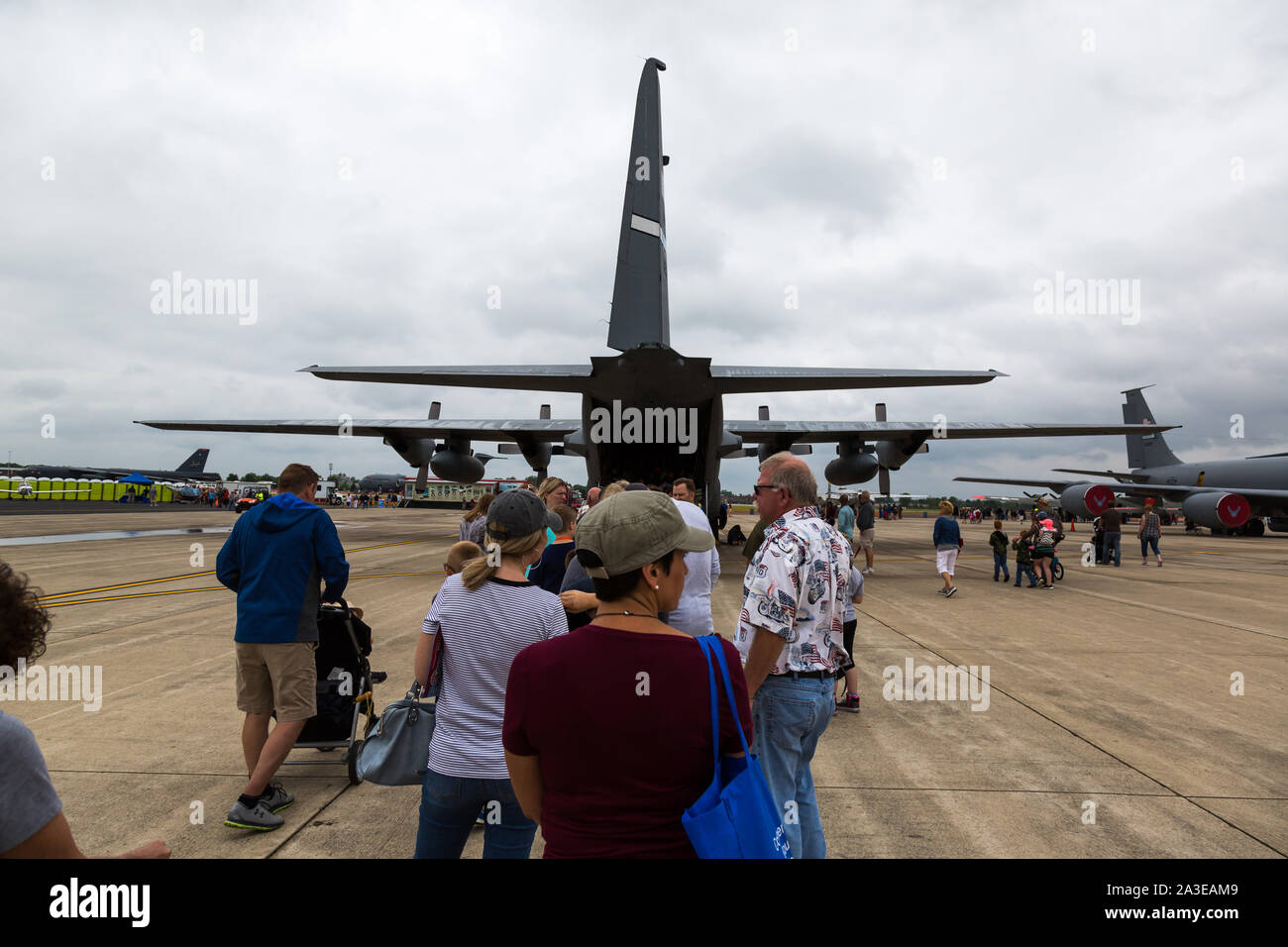 People line up to tour an iconic United States Air Force C-130 Hercules cargo plane at the Fort Wayne Airshow in Fort Wayne, Indiana, USA. Stock Photo