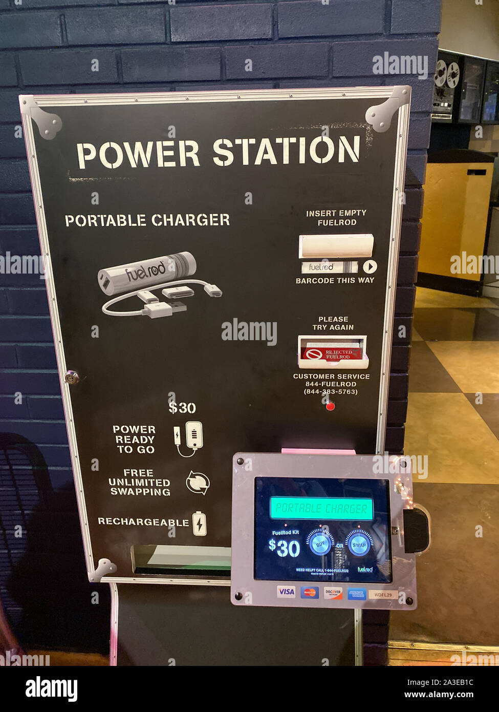 Orlando,FL/USA-10/5/19: FuelRods power station kiosk at a theme park.  FuelRods is a reusable, portable charging system for mobile devices. Stock Photo