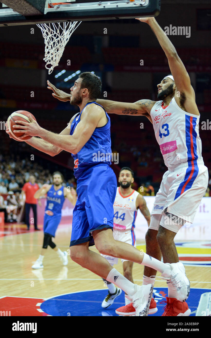 Paul Biligha and Marco Belinelli (Italy) celebrating a block