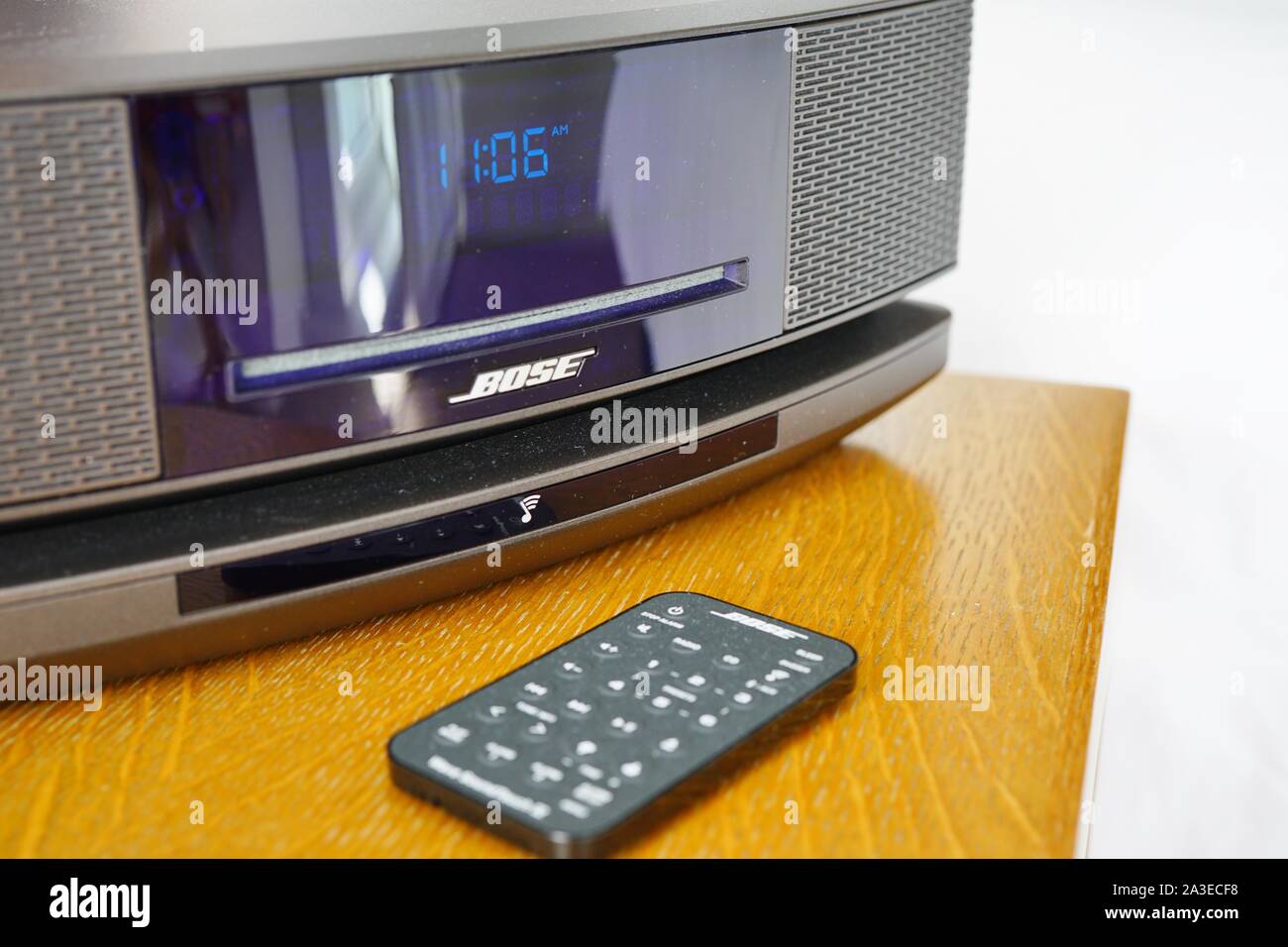 NEW YORK CITY, NY -4 OCT 2019- View of a Bose alarm clock sound system on a  nightstand. Bose is a high-end audio equipment company Stock Photo - Alamy