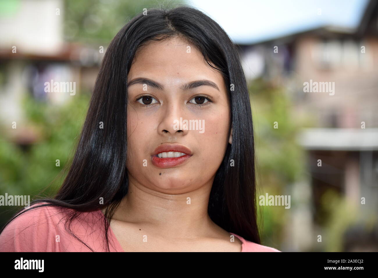 A Smirking Attractive Filipina Female Stock Photo