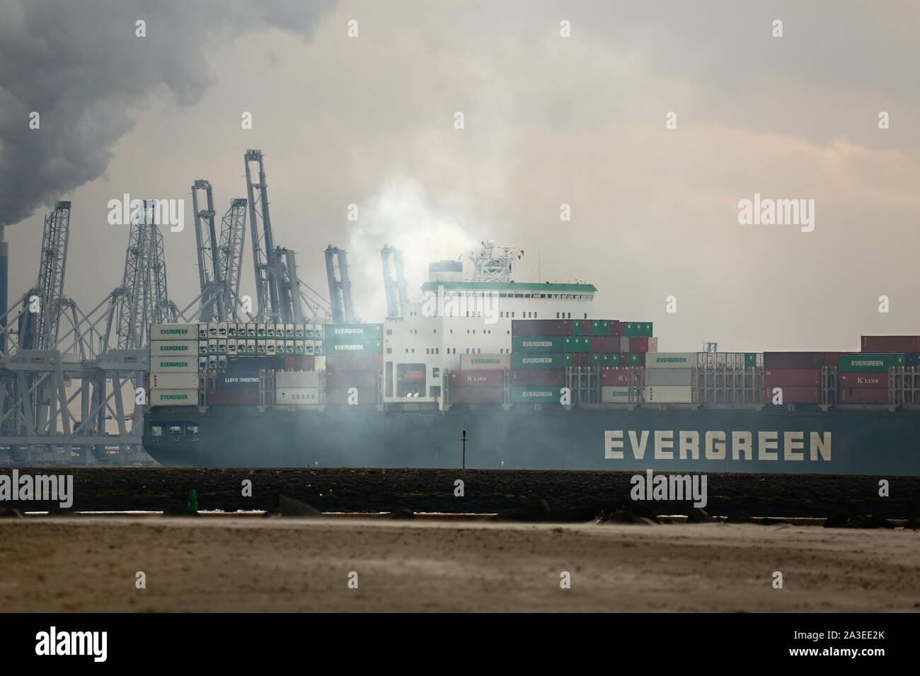 Cargo ship exhaust smoke Stock Photo
