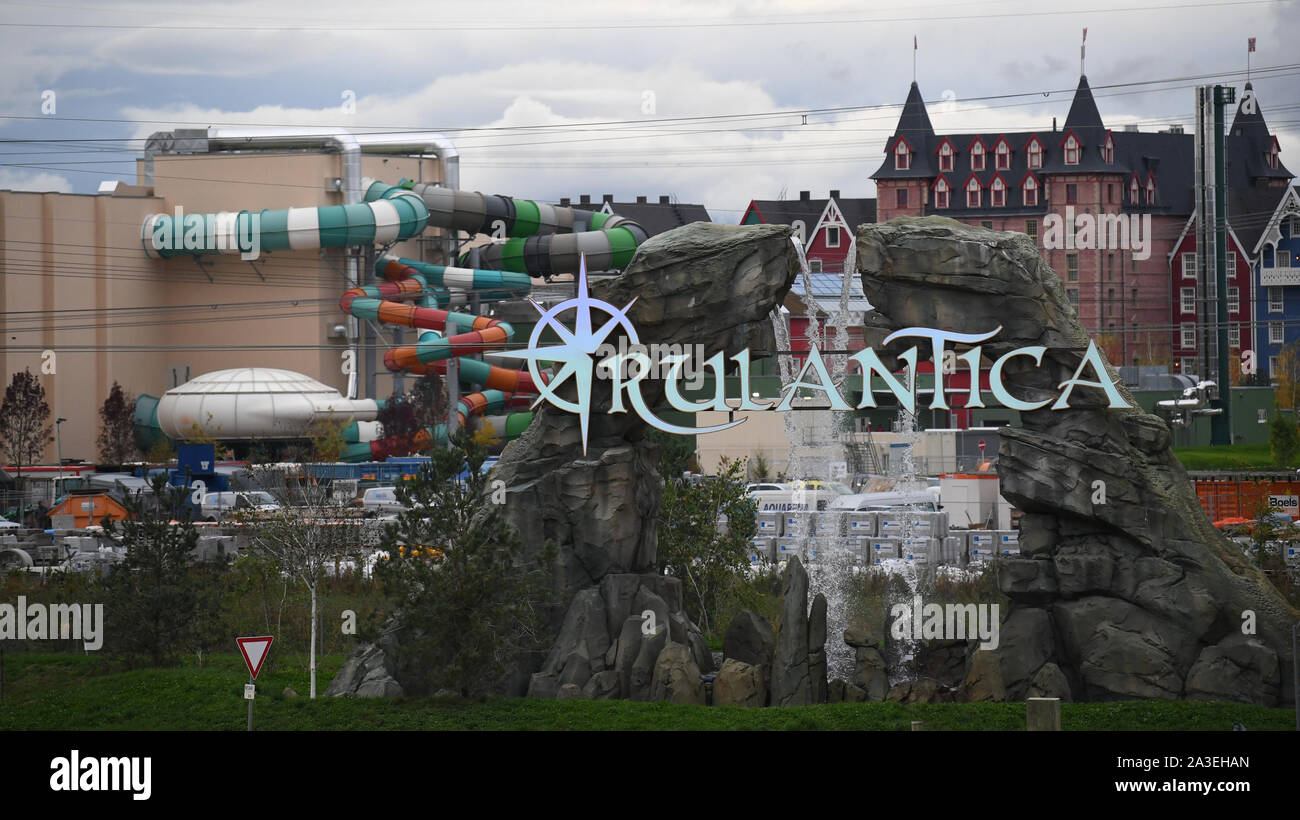 07 October 2019, Baden-Wuerttemberg, Rust: The lettering 'Rulantica' stands in front of the new water park in Europa-Park. Germany's largest amusement park, the Europa-Park in Rust near Freiburg, expects more than six million visitors a year in the future. Reasons for the expected significant increase in the number of guests are the constant expansion of the range of services and the new water world 'Rulantica'. Around 180 million euros were invested in the construction of the 45 hectare water world. It is currently the largest private construction project in Baden-Württemberg. Building starte Stock Photo