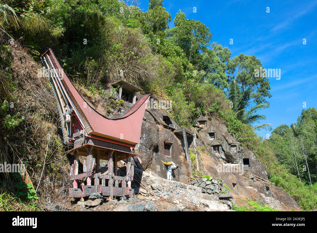 Cliffs burial site, traditional burial ground in Tana Toraja, worldwide unique ancestor cult of Sulawesi, Indonesia Stock Photo