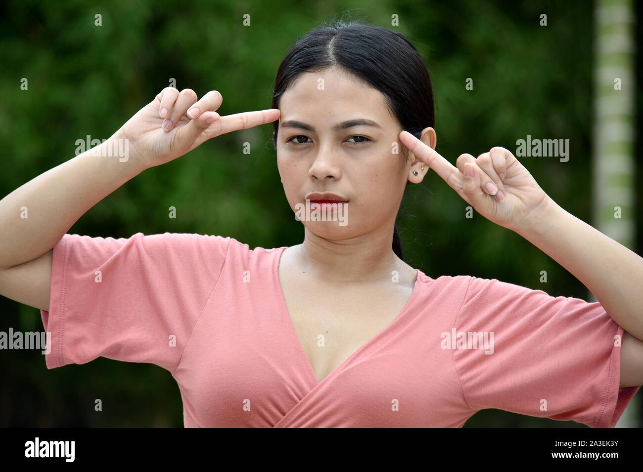 A Dumb Beautiful Asian Female Stock Photo