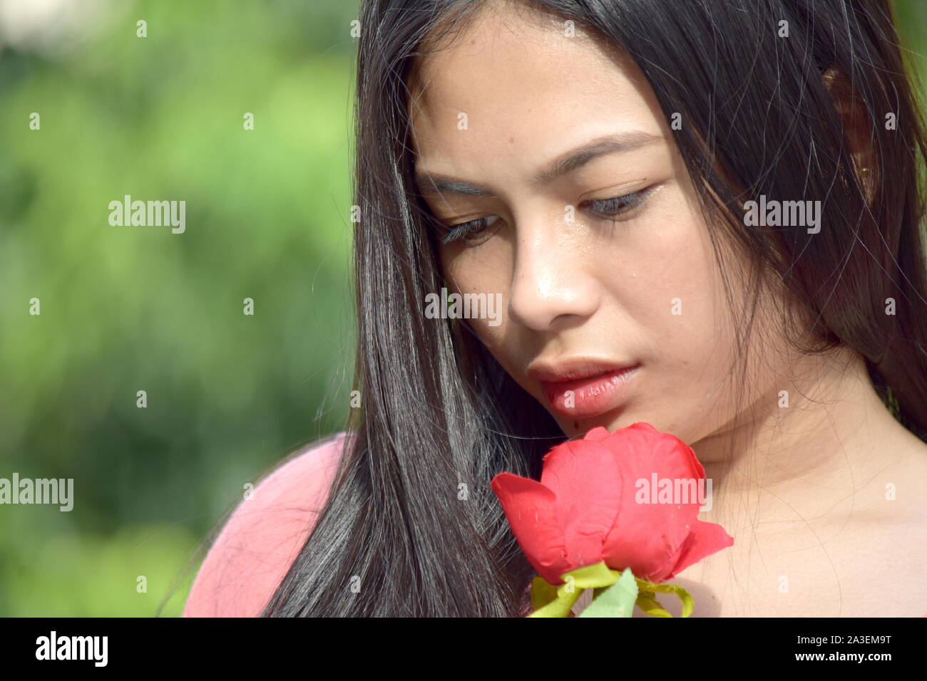 Female sad flowers hi-res stock photography and images - Alamy