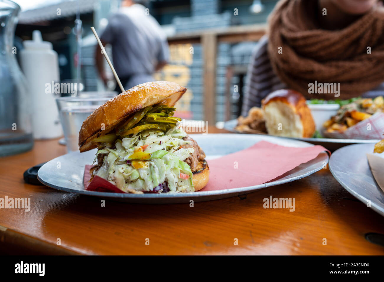 Barbeque and cole slaw bbq sandwich at outdoor picnic and grill Stock Photo