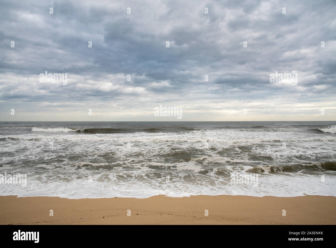 A seashore scene in which high waves come with cloudy weather and strong winds. South Korea Donghae the sea. Stock Photo