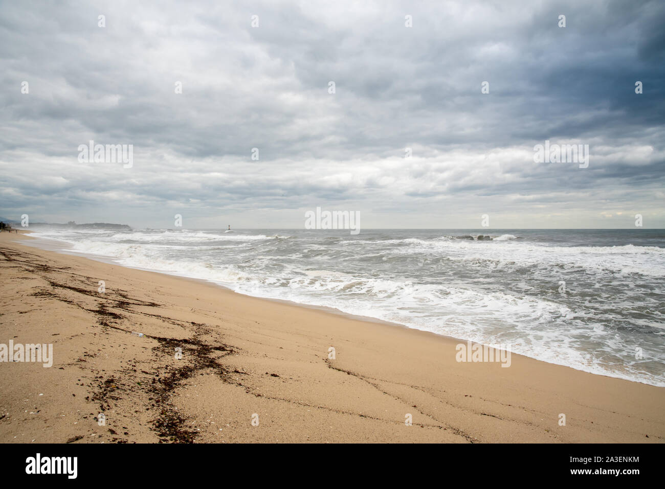 A seashore scene in which high waves come with cloudy weather and strong winds. South Korea Donghae the sea. Stock Photo