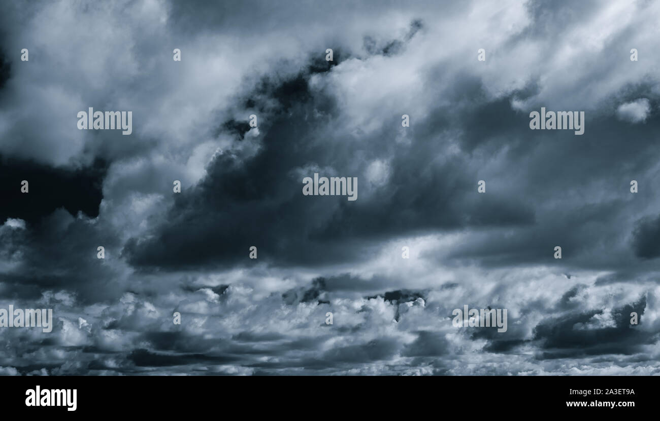 Gray and white cloud abstract background. Sad, dead, hopeless, and despair background. Thunder and storm concept. Gray sky and fluffy clouds. Unlucky Stock Photo