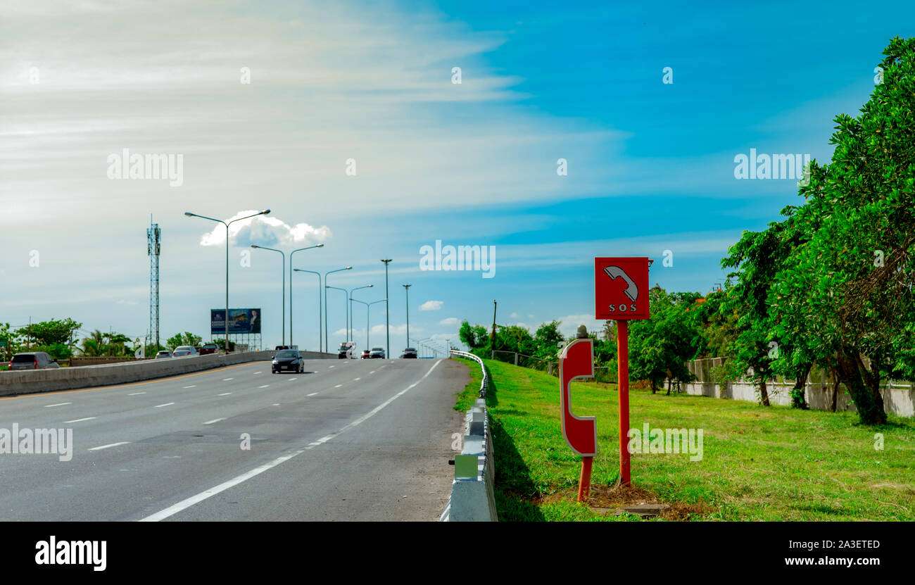 Emergency SOS telephone installed at roadside. Highway SOS call box