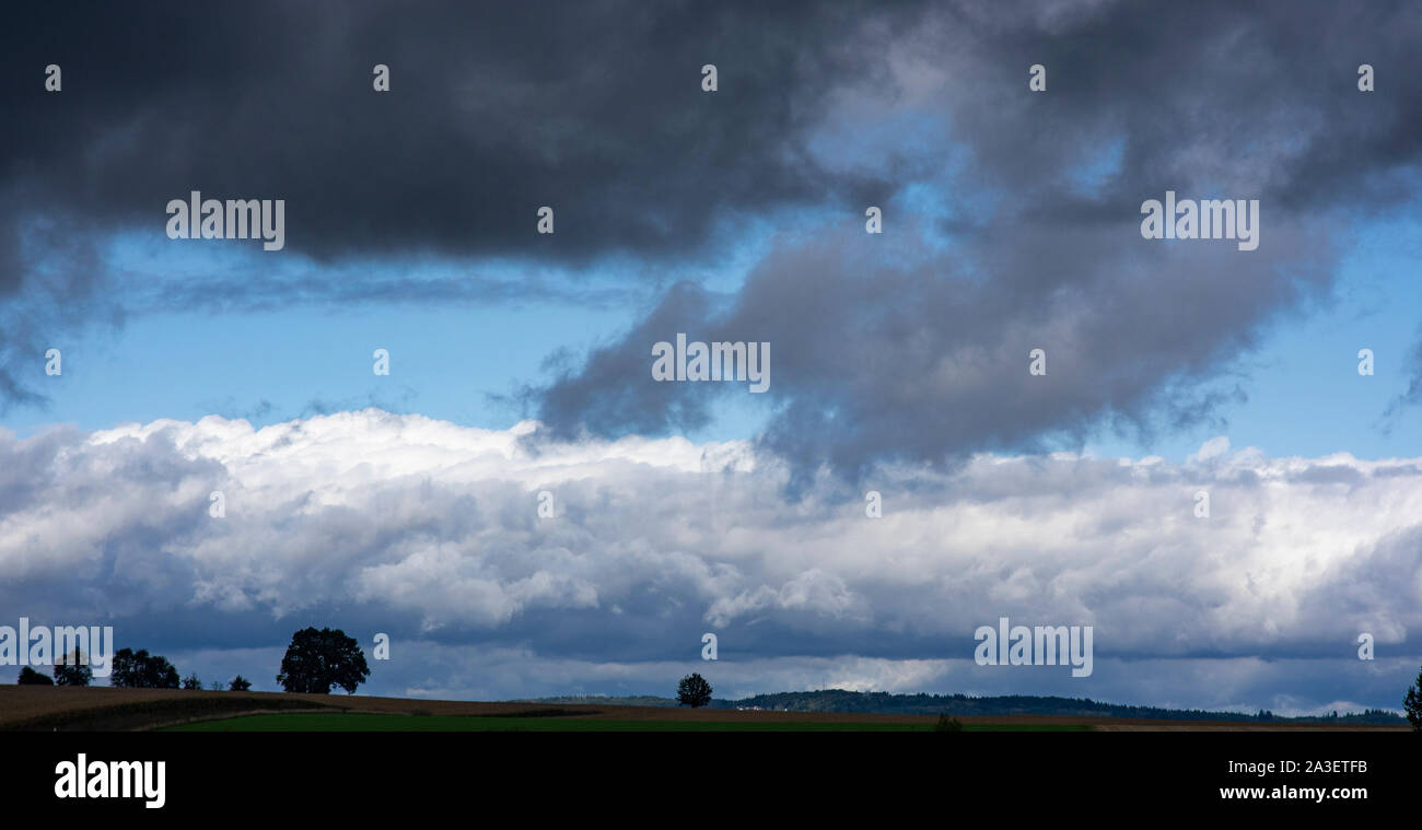 cloudscape with blue sky white clouds at the horizon Stock Photo - Alamy