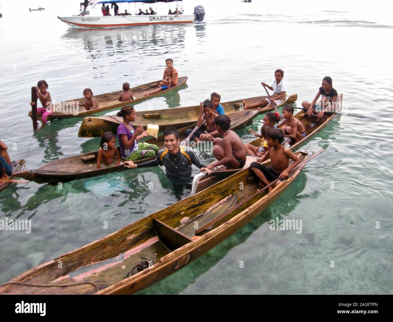 Bajau Laut Kids playing by the sea Stock Photo