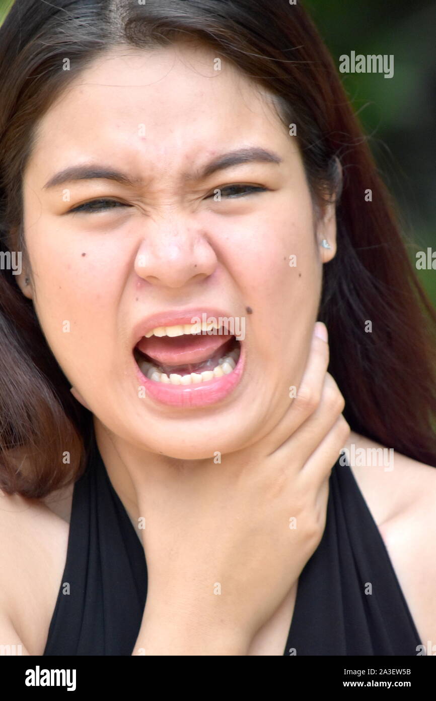 An Adult Female Choking Stock Photo Alamy