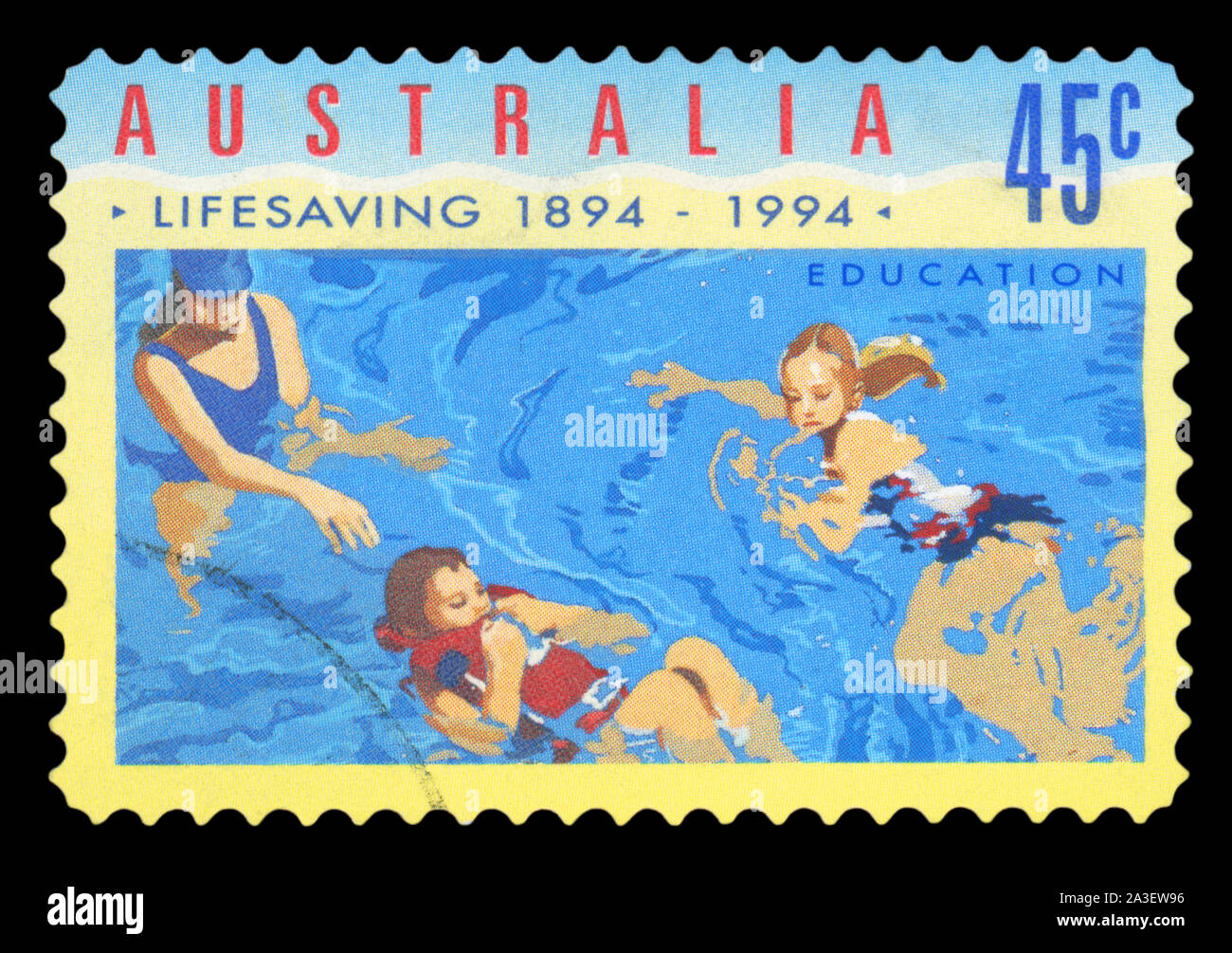 AUSTRALIA - CIRCA 1994: A stamp printed in AUSTRALIA shows the People in Water, Centenary of Organized Life-saving in Australia series, circa 1994 Stock Photo