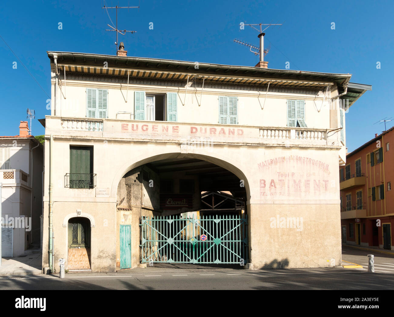Builder's merchant housed in early 20th century building in Villefranche sur Mer, France, Europe Stock Photo