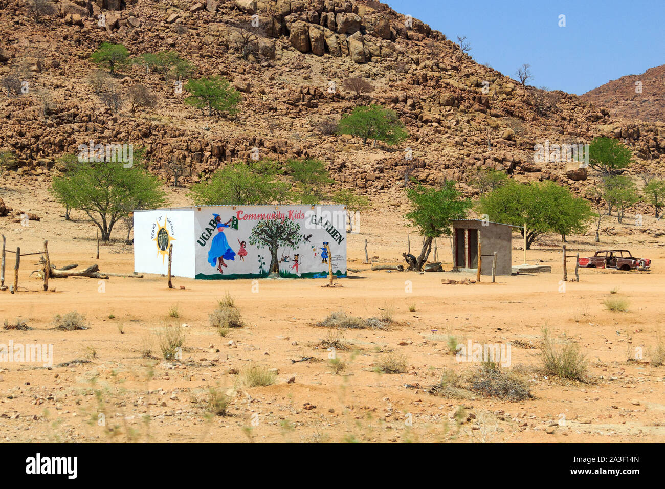 Abandoned kindergarten with a painting on the wall, Damaraland, Namibia, Africa Stock Photo