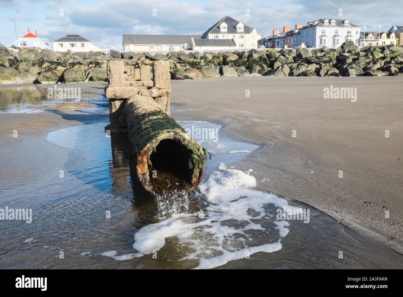 Overflow,pipe,Borth Beach,Borth,coastal,village,holiday,resort,north,of,Aberystwyth,on,Cardigan,Bay,coast,coastline,Ceredigion,Wales,Welsh,UK Stock Photo