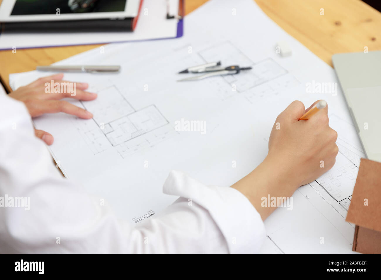 Engineer and Architect concept, Engineer Architects office team working with blueprints Stock Photo
