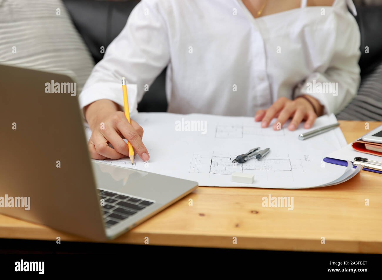 Engineer and Architect concept, Engineer Architects office team working with blueprints Stock Photo