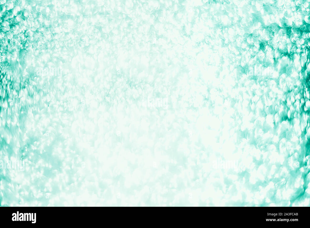 Christmas And New Year Holiday Neo Mint Green Glitter Shimmering Festive Abstract Texture Background With Bokeh Defocused Lights Stock Photo Alamy