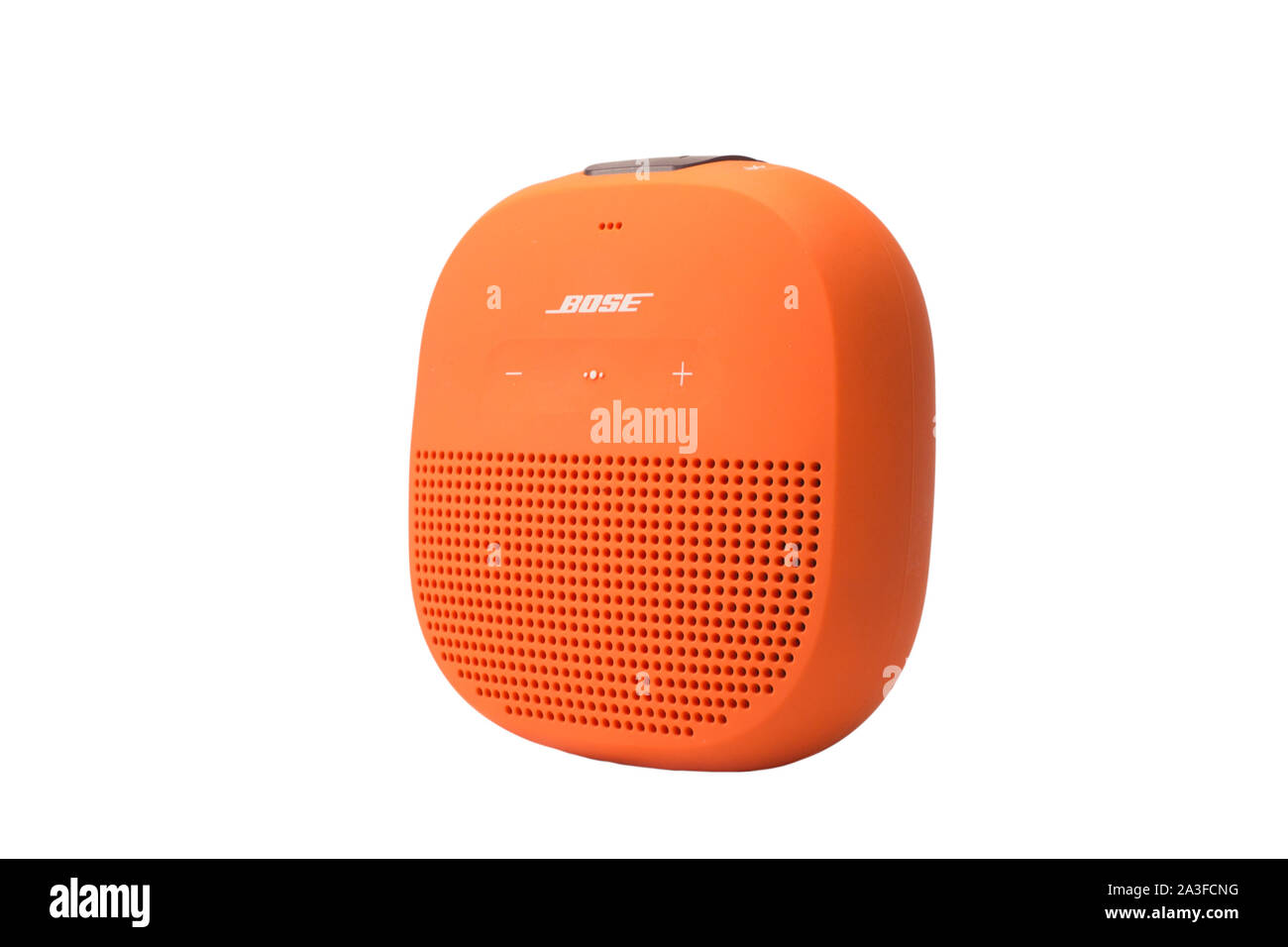 An orange wireless speaker isolated on white Stock Photo