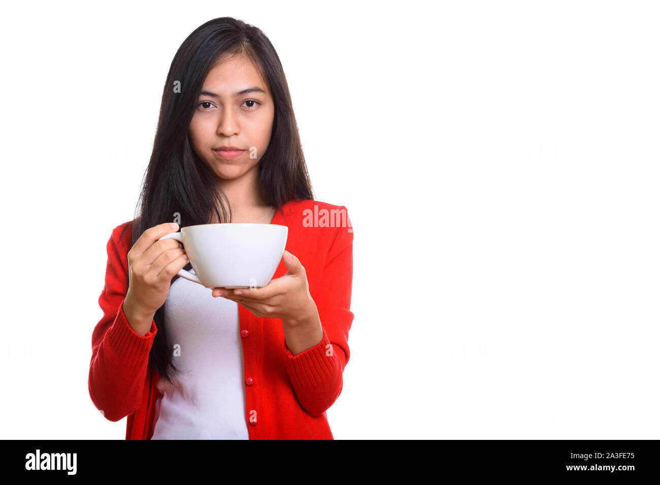 https://c8.alamy.com/comp/2A3FE75/studio-shot-of-young-asian-teenage-girl-holding-coffee-cup-2A3FE75.jpg