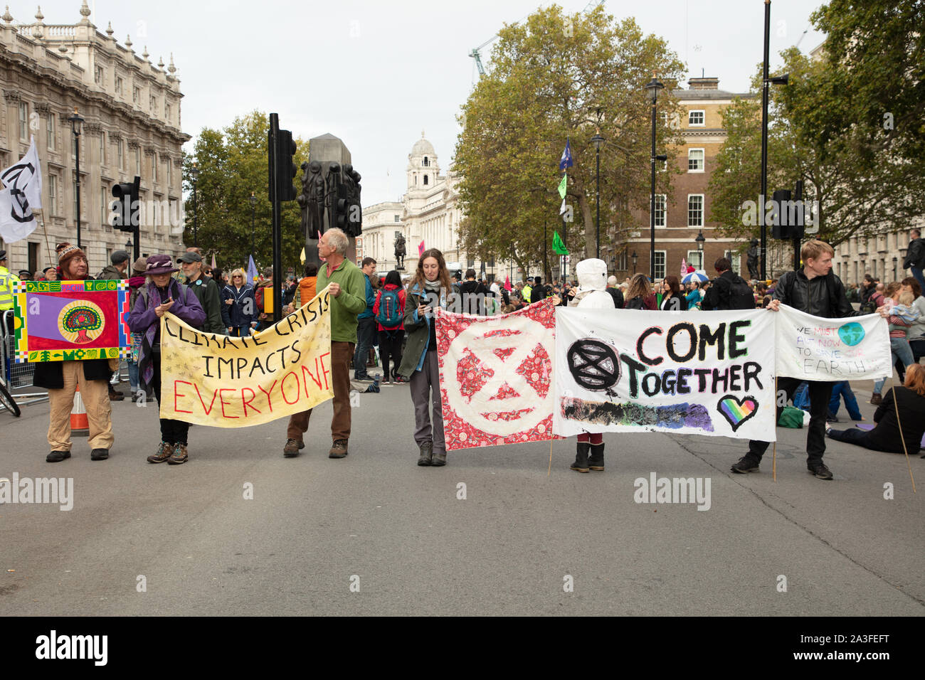 London, UK. 7th October 2019. Extinction Rebellion protesters in front of 10 Downing Street at a two week long protest in London. Credit: Joe Kuis / Alamy News Stock Photo