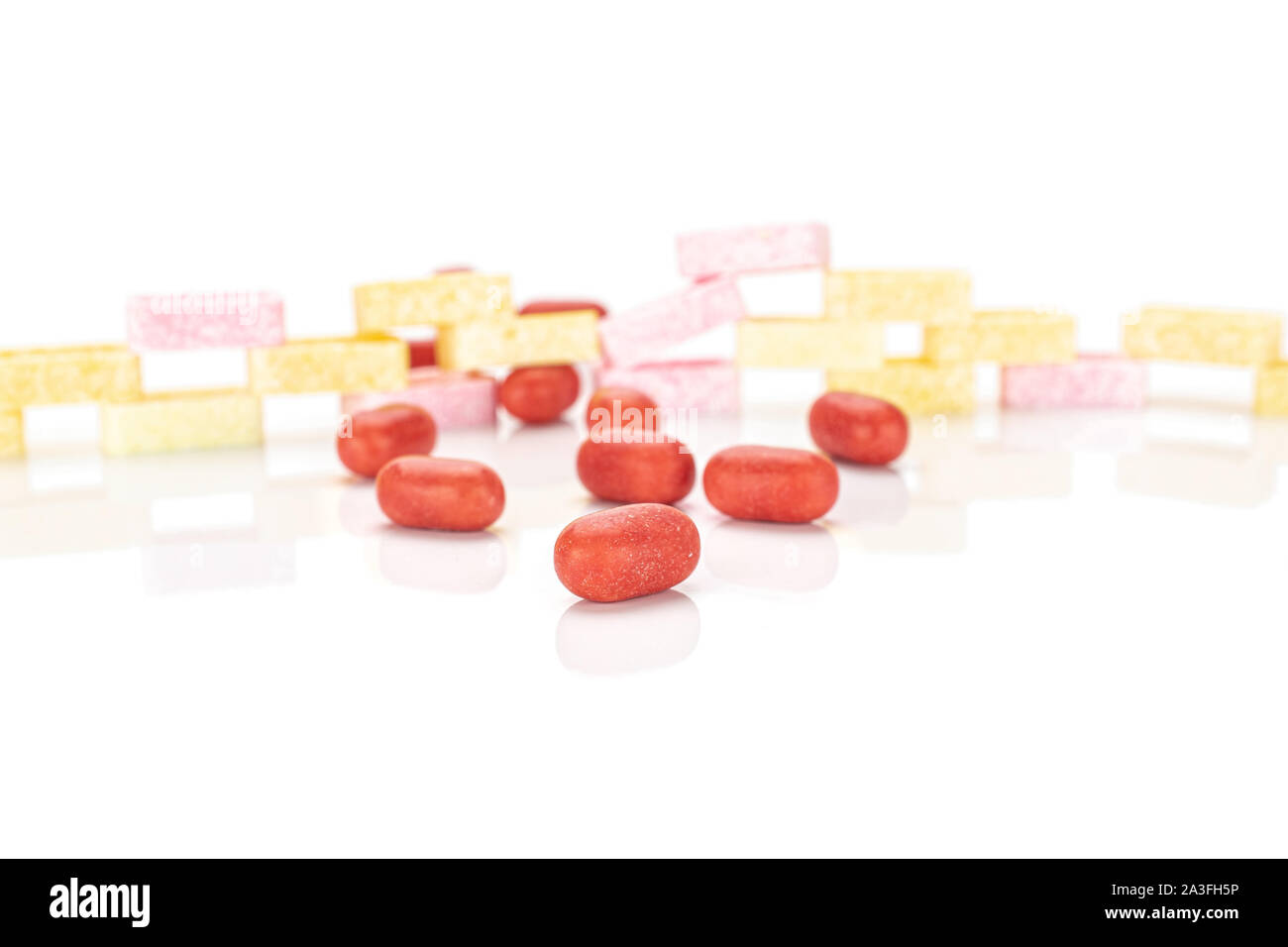 Lot of whole arranged sweet pastel candy isolated on white background ...