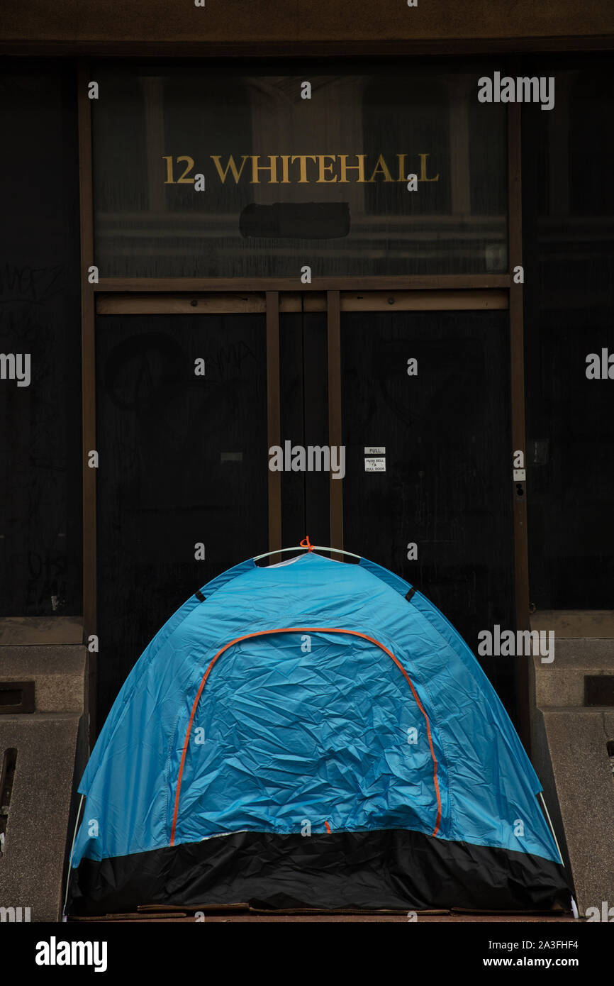London, UK. 7th October 2019. Tent seen in front of 12 Whitehall, Westminster, London, during as Extinction Rebellion two week long protest in London. Credit: Joe Kuis / Alamy News Stock Photo