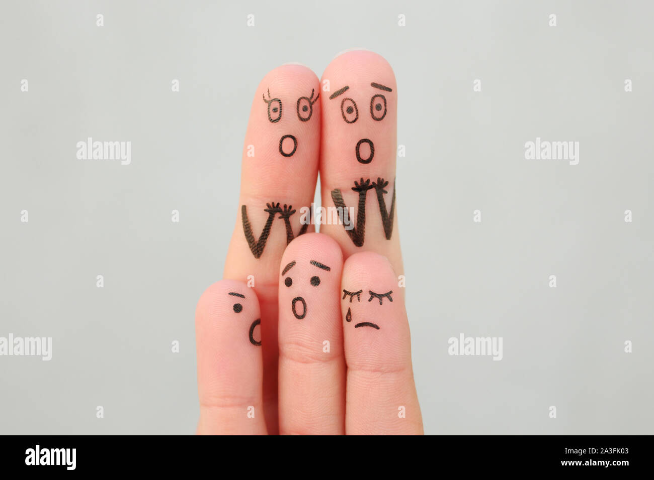 Fingers art of family during quarrel. Concept children are crying. Stock Photo