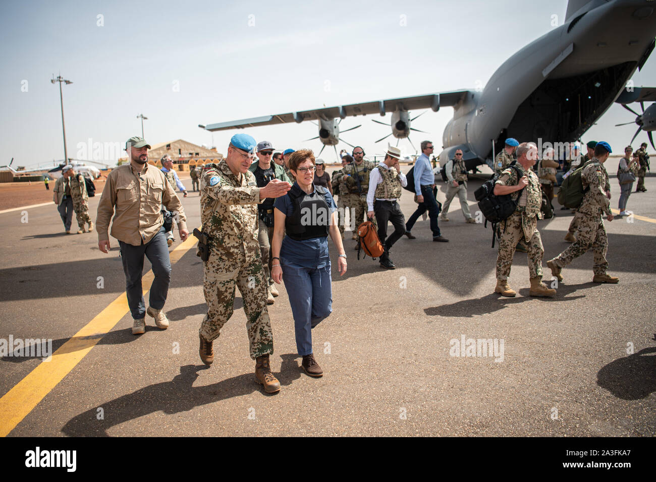 Gao, Mali. 08th Oct, 2019. Annegret Kramp-Karrenbauer (CDU), Federal Minister of Defense, and Colonel Ingo Korzetz, the German contingent leader in Gao, will go from airport to convoy. On the third day of her trip to West Africa, the Defence Minister is visiting German soldiers in Gao. Credit: Arne Immanuel Bänsch/dpa/Alamy Live News Stock Photo