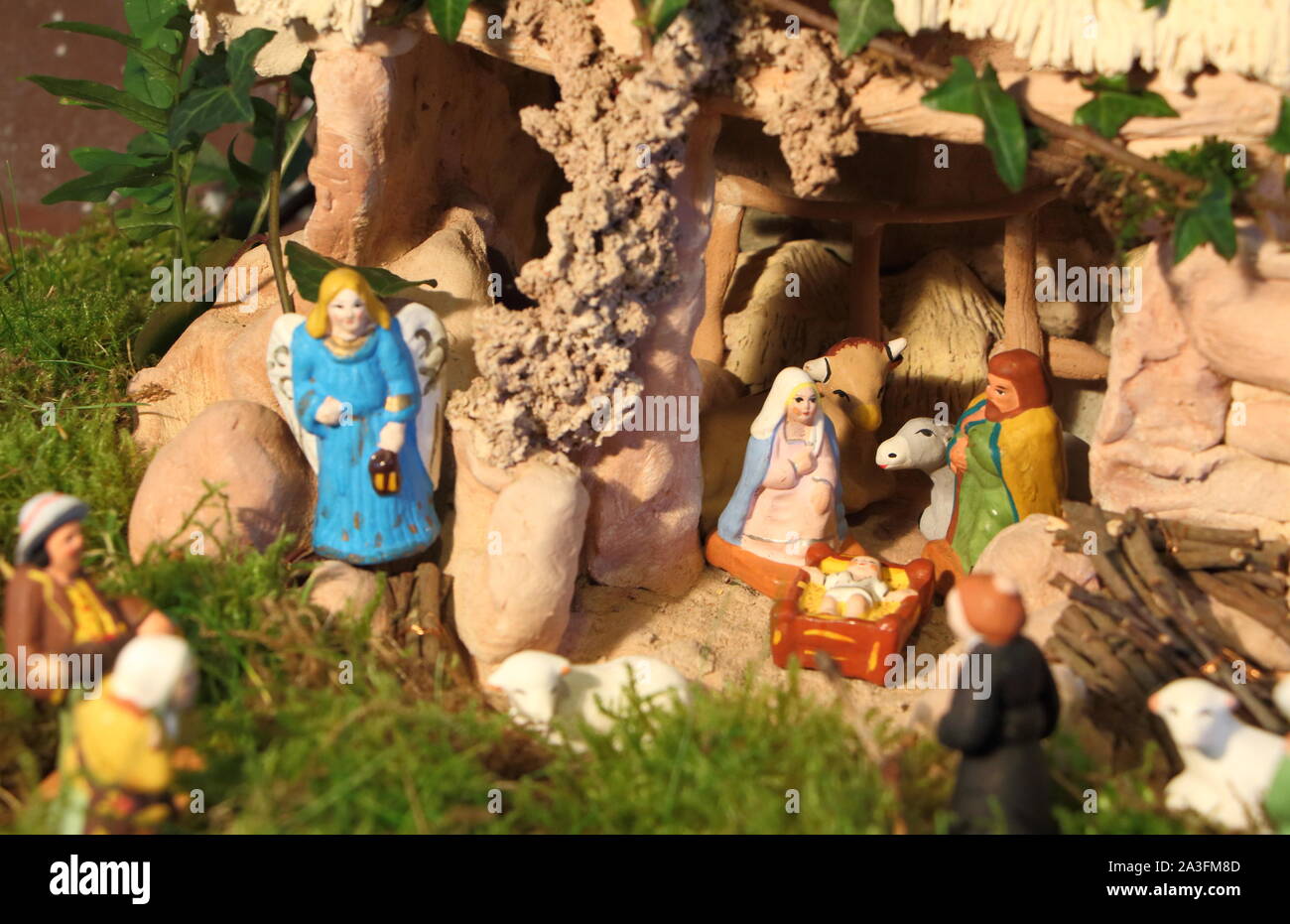 Mary, Joseph, Jesus in nativity scene with provencal Christmas crib ...