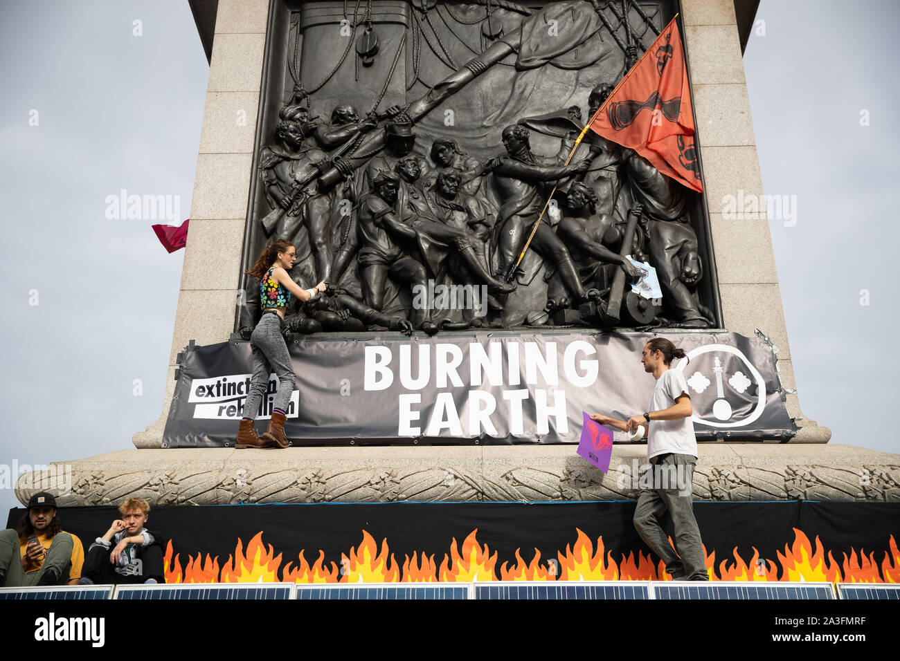Protesters during an Extinction Rebellion (XR) protest in Trafalgar Square, London. Stock Photo