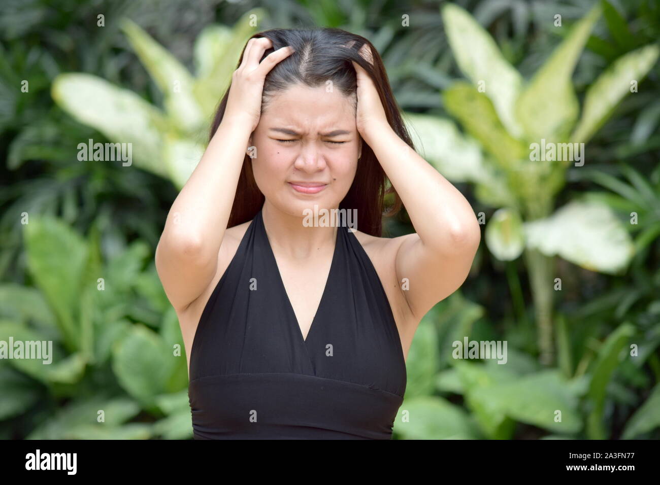 A Filipina Woman And Anxiety Stock Photo