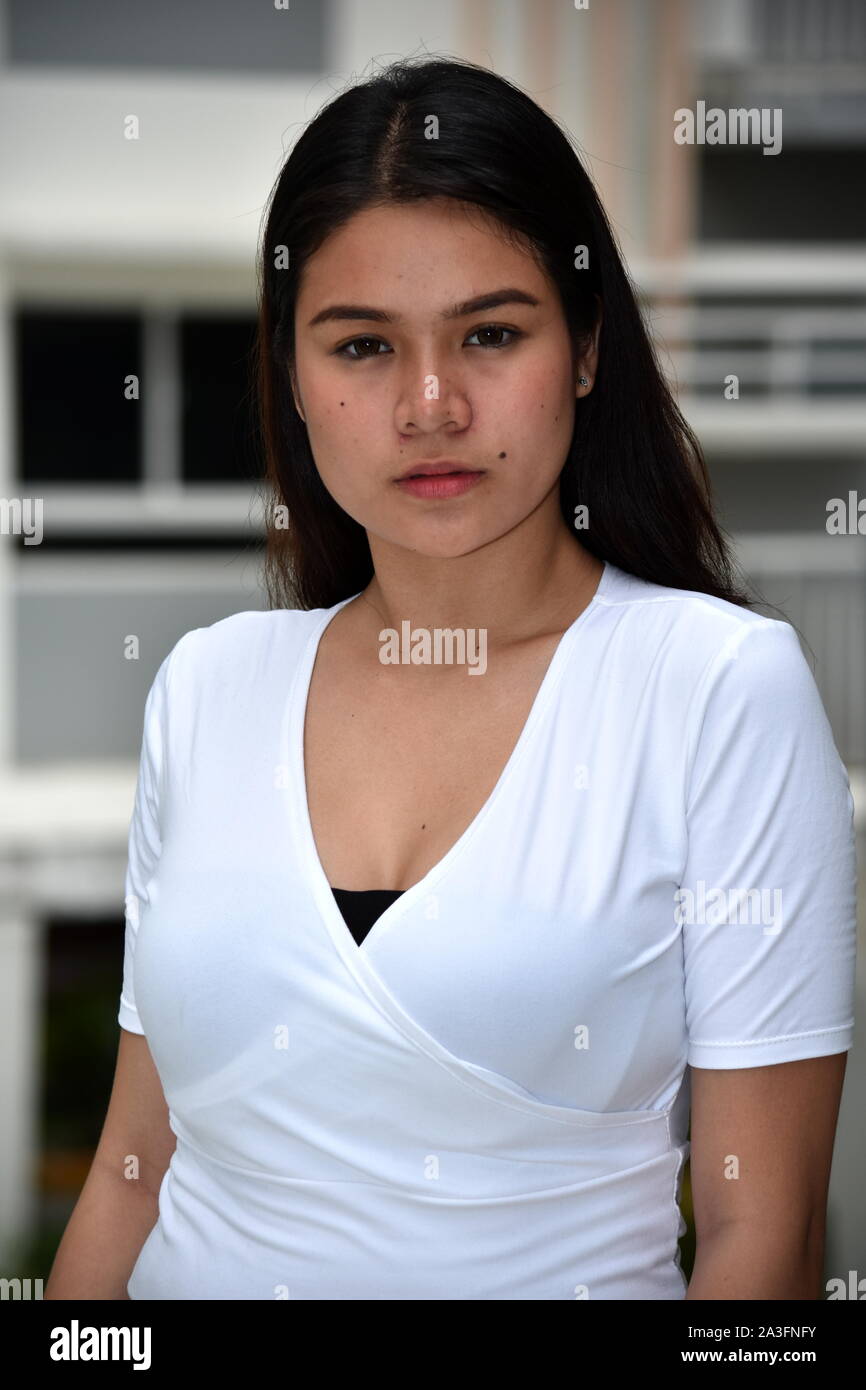 Serious attractive asian adult hi-res stock photography and images - Alamy