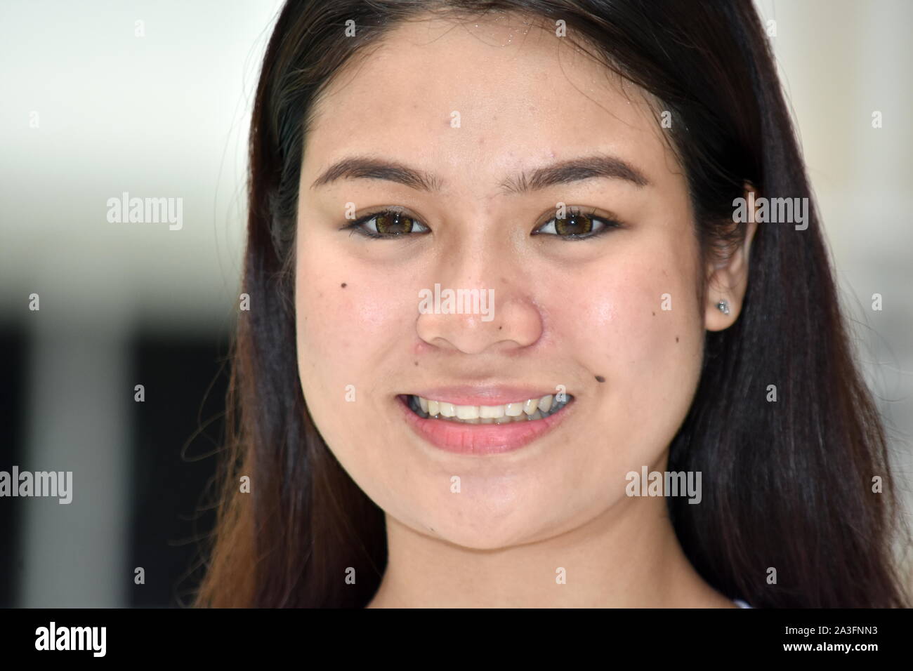 A Smiling Young Female Stock Photo