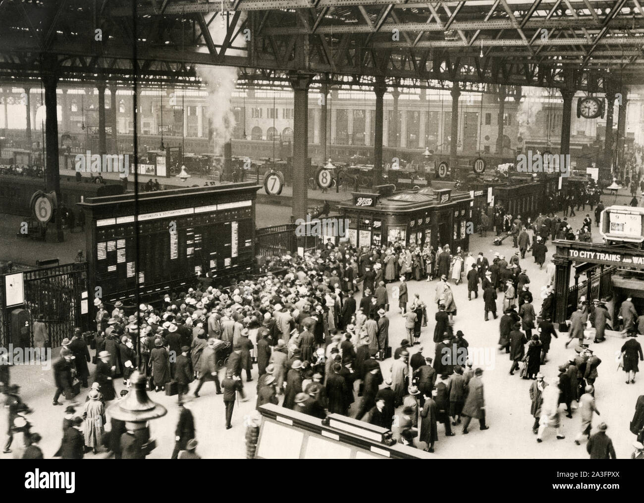 Interior of Waterloo train station London during a bank holiday rush, c.1920s Stock Photo