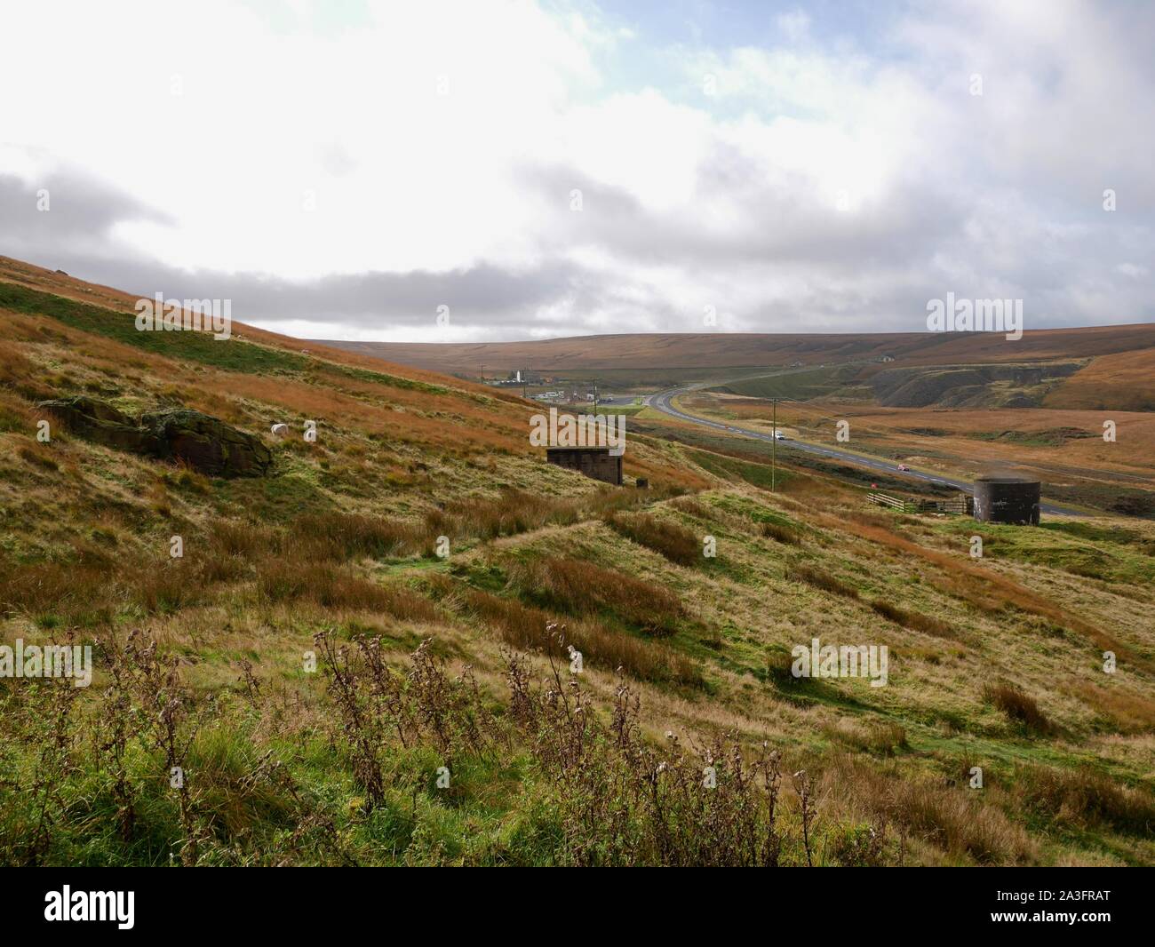 From high on the Pennine moors looking up the A 62 road in the distance from Marsden Huddersfield Yorkshire England Stock Photo